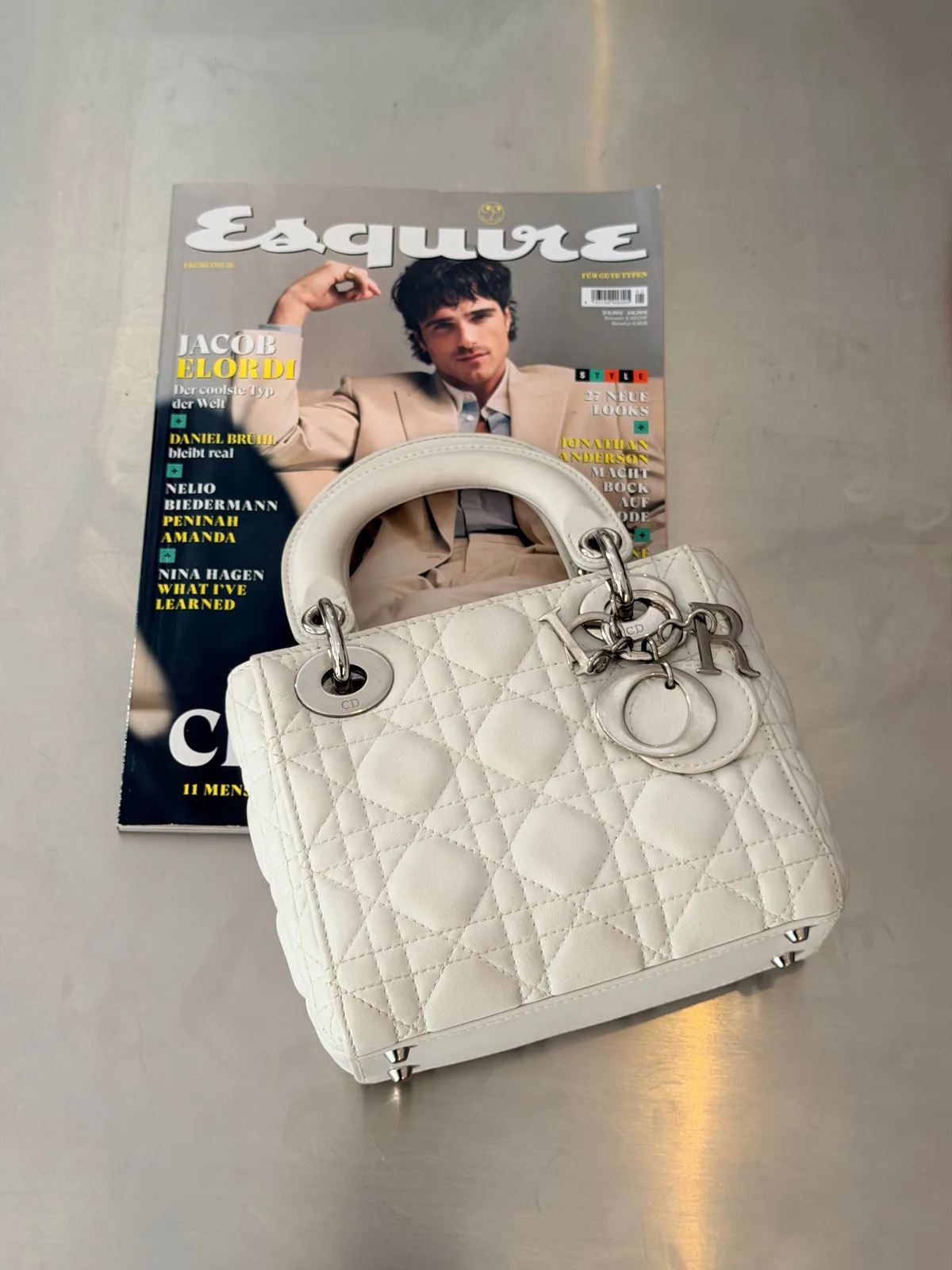 Ivory Lady Dior photographed on a fashion magazine