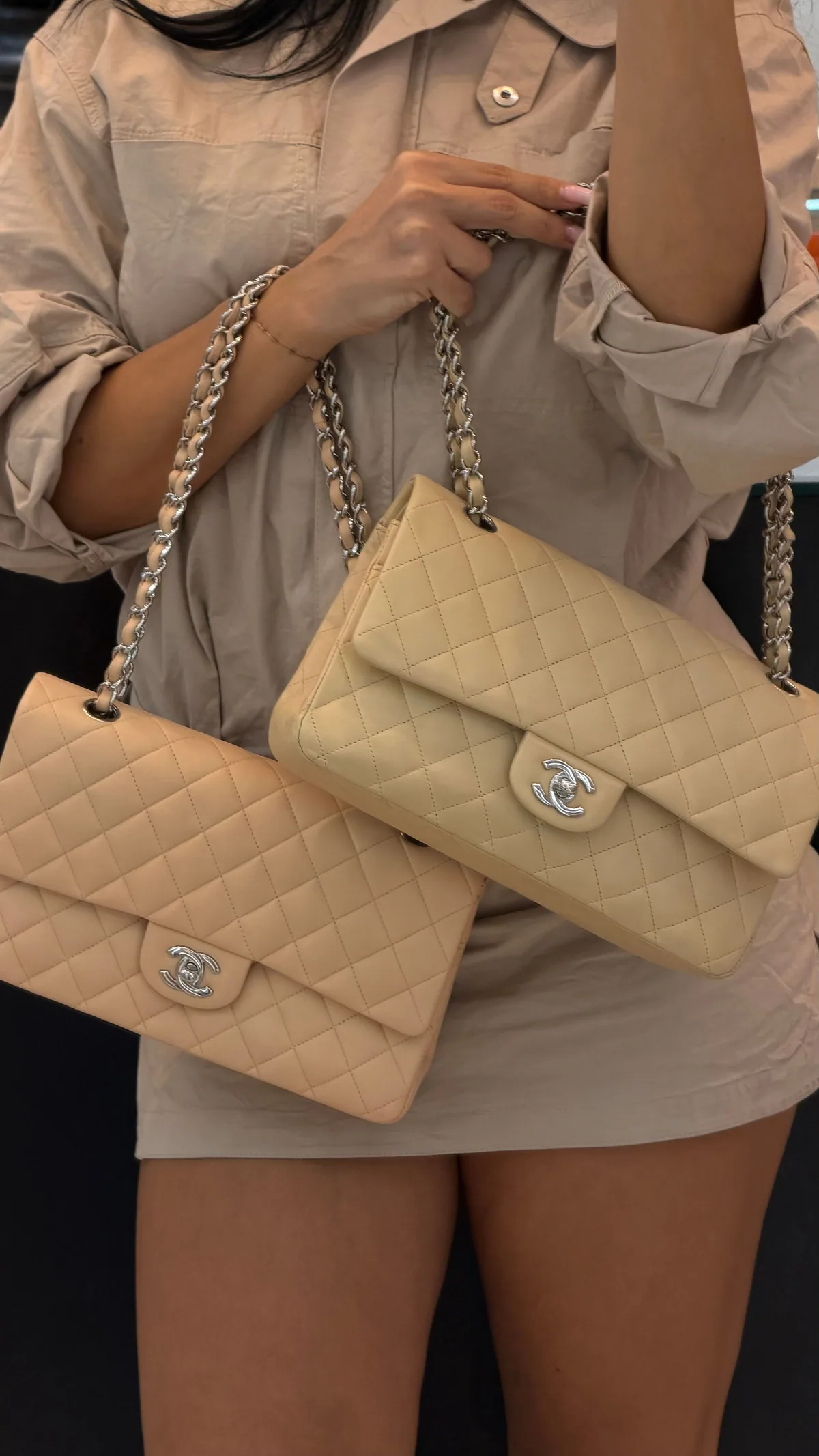 Two neutral Chanel flap bags styled with a taupe shirt